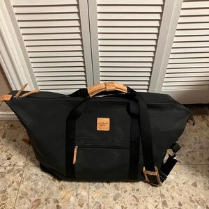 Jon Hart Design Black Travel Bag with Tan Accents